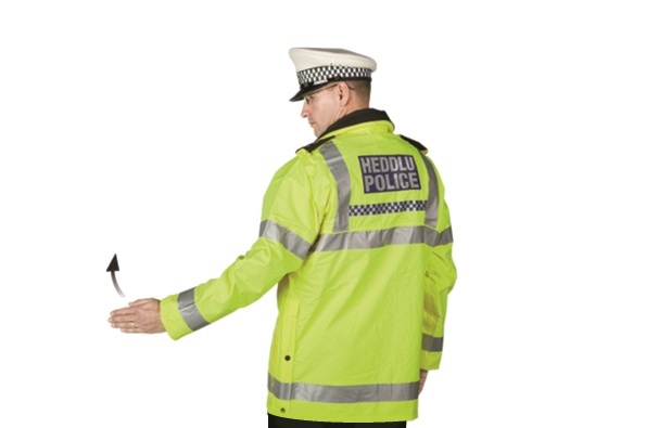 Police Office Hand Signal - Beckoning traffic from behind on