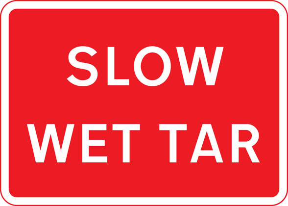 Traffic Sign - Temporary hazard at road works (slow wet tar)