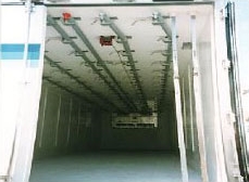 Refrigerated trailer fitted with meat hooks